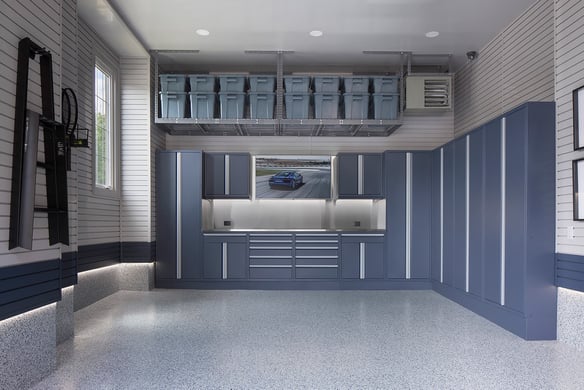 Garage remodel large single car garage blue cabinetry floor coating overhead storage