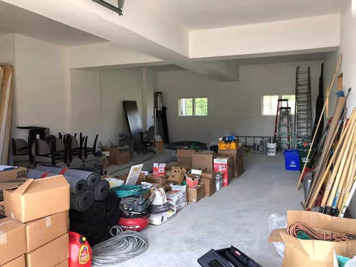 Double car lift before by Garage Living